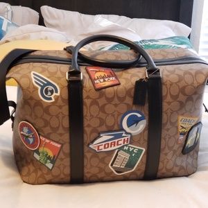 Coach Voyager signature luggage bag